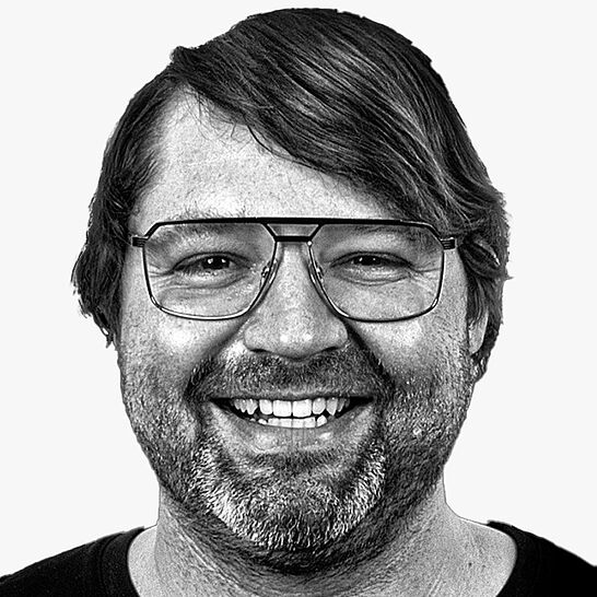 [Translate to Deutsch (Schweiz):] Portraitbild des Referenten in schwarz-weiß, Georg Ostertag