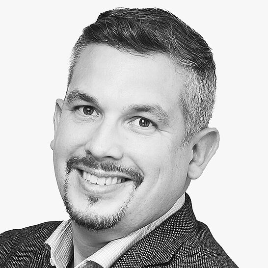 [Translate to Deutsch (Schweiz):] Portraitbild des Referenten in schwarz-weiß, Dr. med. dent. Arndt-Christian Höhne