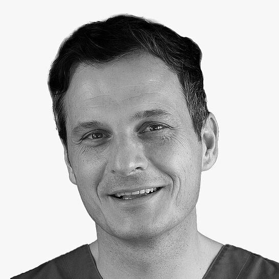 [Translate to Deutsch (Schweiz):] Portraitbild des Referenten in schwarz-weiß, Dr. Markus Sperlich