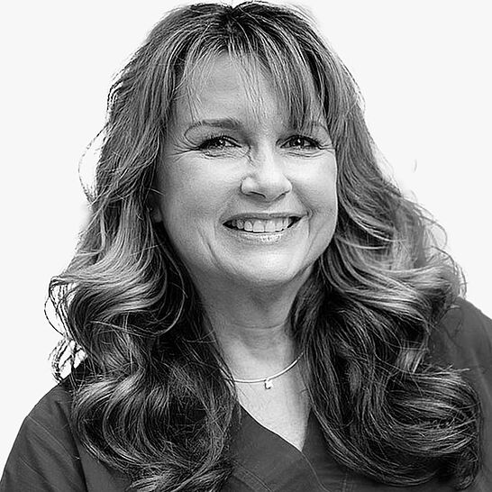 [Translate to Deutsch (Schweiz):] Portraitbild des Referenten in schwarz-weiß, Dr. John-Weißer