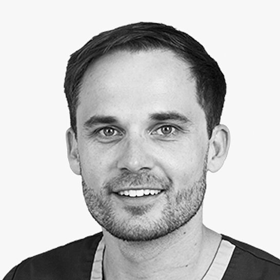 Portraitbild des Referenten in schwarz-weiß, Dr. Rammer-Viden