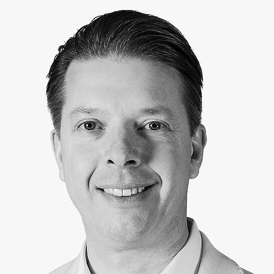 [Translate to Deutsch (Schweiz):] Portraitbild des Referenten in schwarz-weiß, Mathias Uhlig