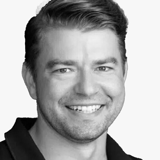 [Translate to Deutsch (Schweiz):] Portraitbild des Referenten in schwarz-weiß, Dr. Mühlig