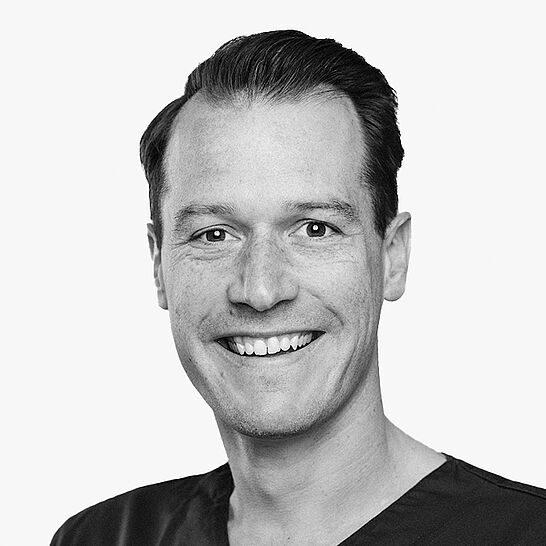 Portraitbild des Referenten in schwarz-weiß, Dr. Eichler